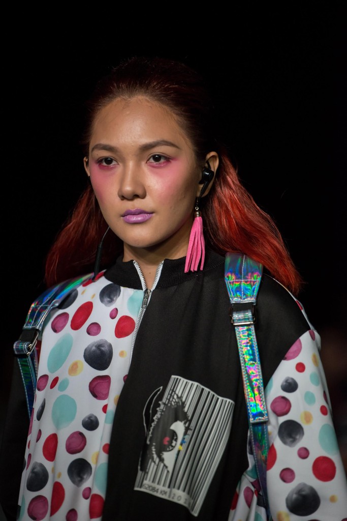 The Jabra Sport Pulse Special Edition earphones complete the look of this runway model at the 21st Philippine Fashion Week